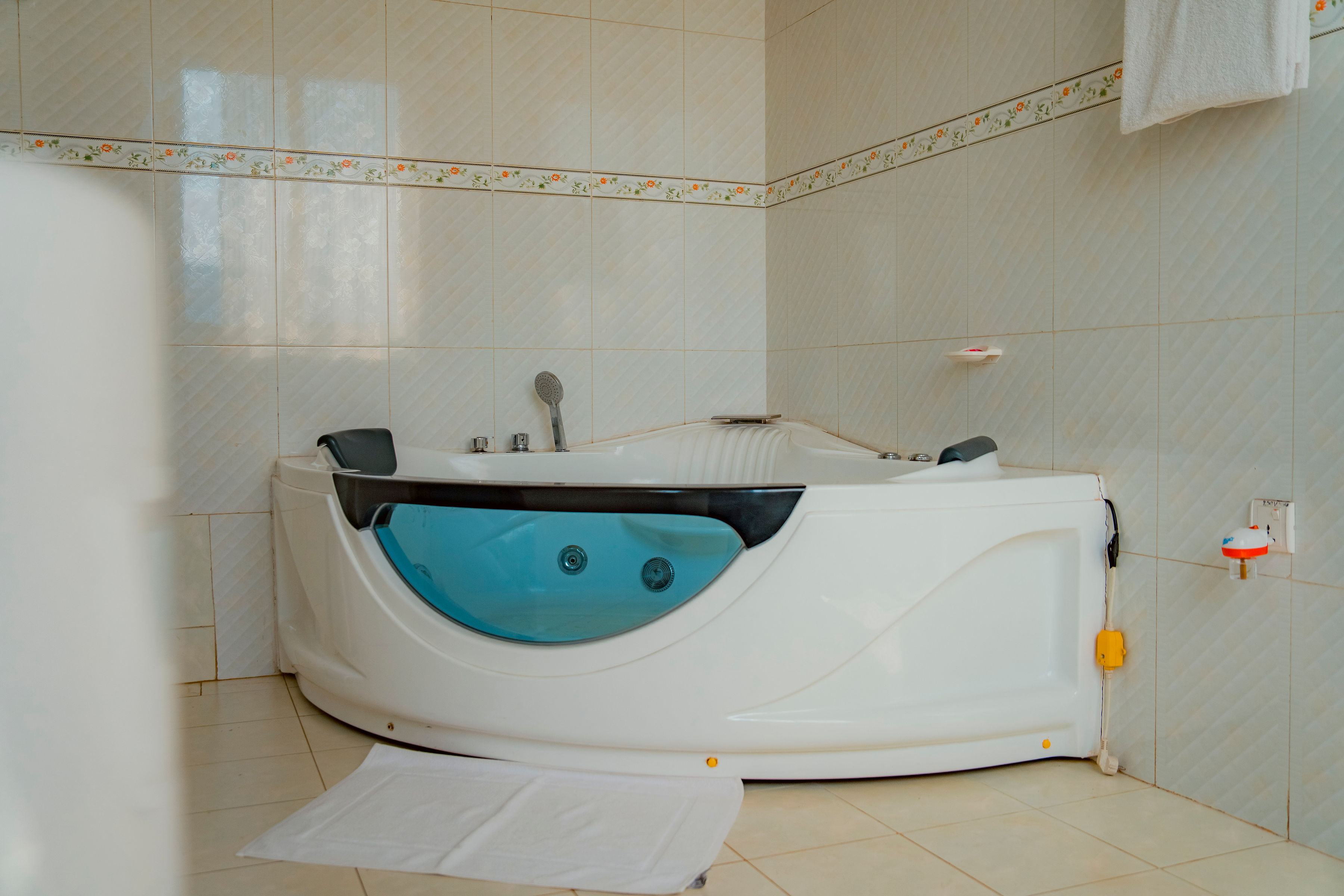 Luxury spa with candles and treatment area