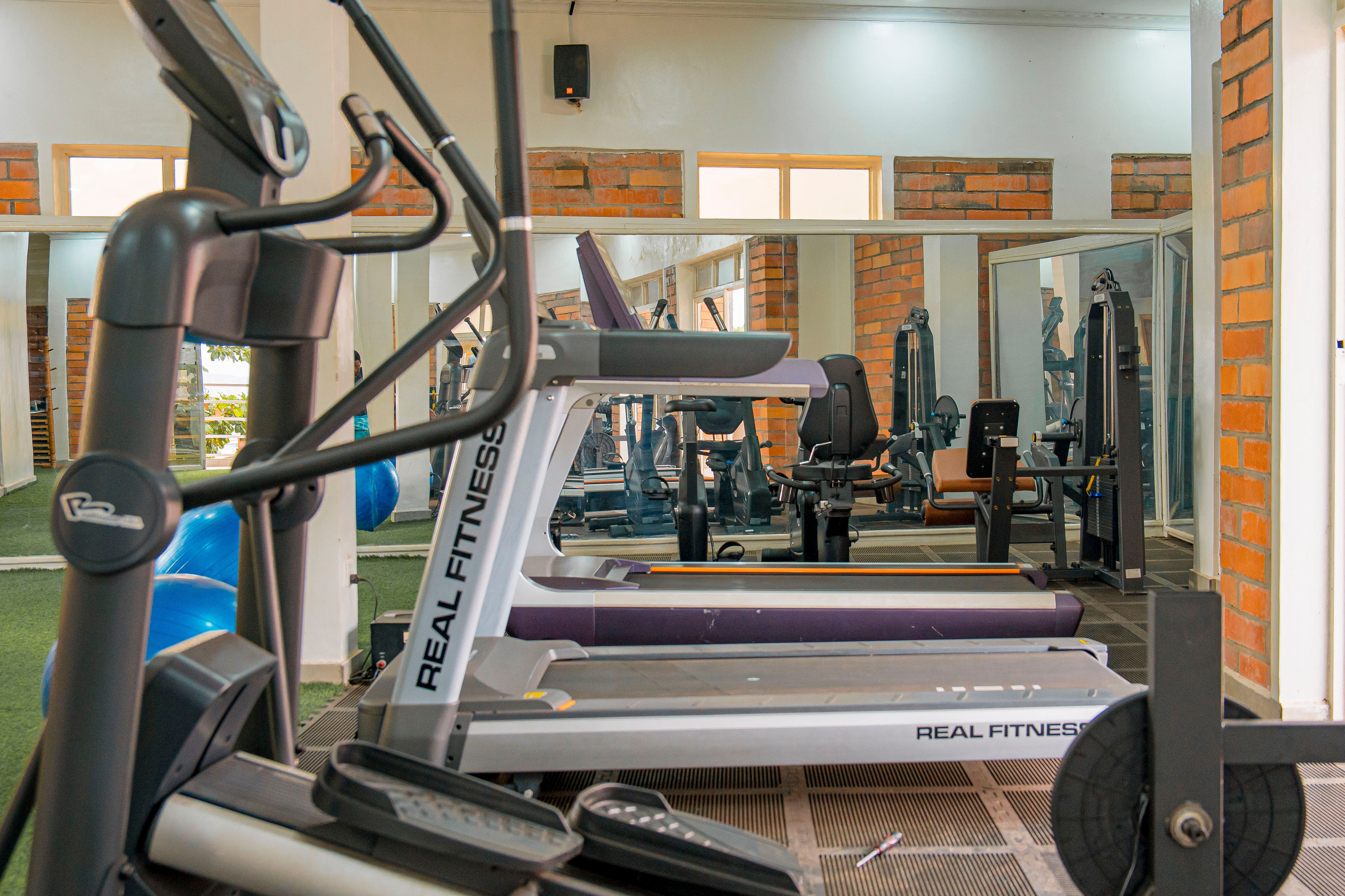Modern fitness center with treadmills and exercise equipment